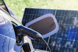 Electric Car Charging From A Solar Panel Close Up